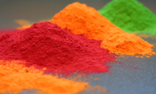 Photo of three colors of powder coating